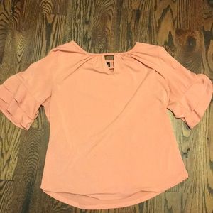 Pink blouse with ruffle sleeves